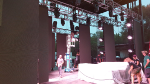 Custom vertical modular LED panels integrated into a stage design for a live event production.