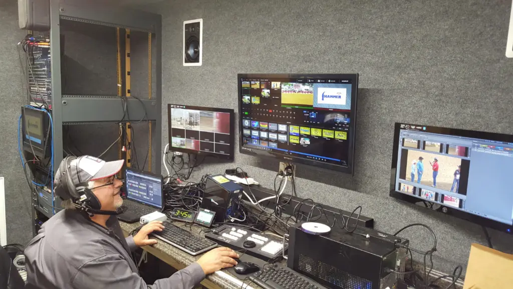 Event production suite inside a mobile LED trailer featuring live video switching, content management, and on-site event support.