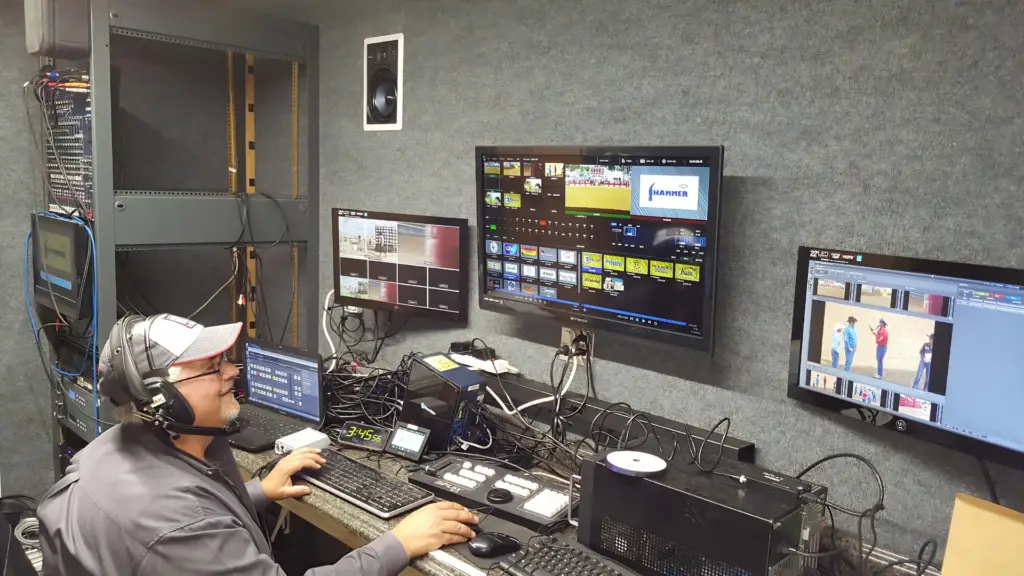 Event production suite inside a mobile LED trailer featuring live video switching, content management, and on-site event support.